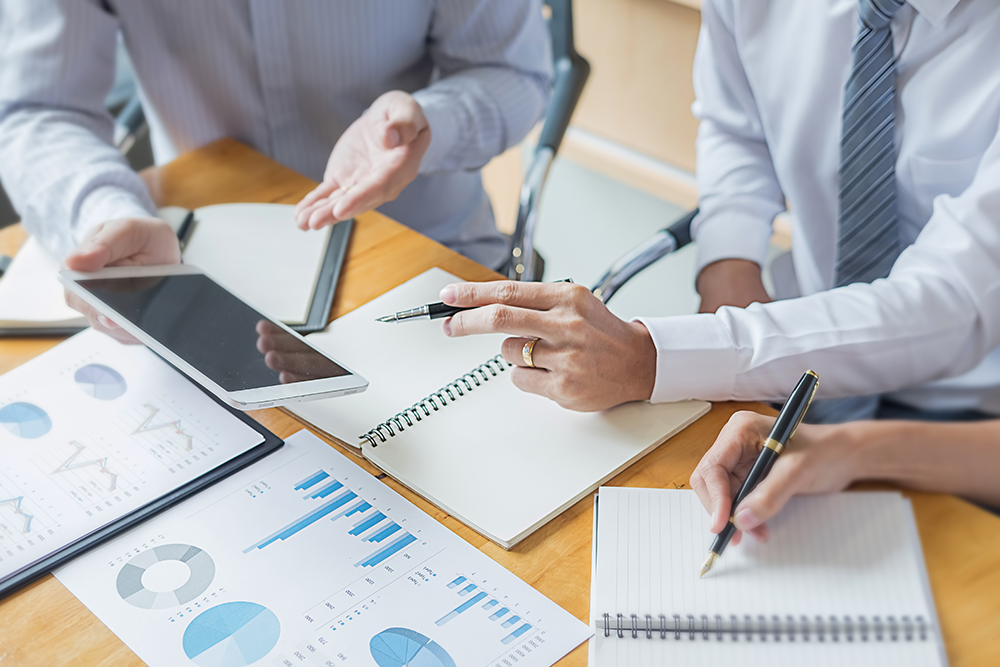 Two Men Checking Audit